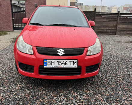 Красный Сузуки СХ4, объемом двигателя 1.59 л и пробегом 183 тыс. км за 6700 $, фото 2 на Automoto.ua
