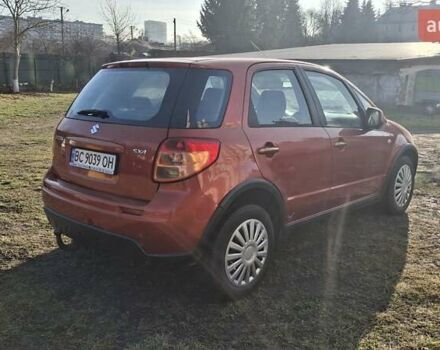 Красный Сузуки СХ4, объемом двигателя 1.5 л и пробегом 123 тыс. км за 4300 $, фото 2 на Automoto.ua