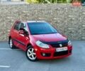 Красный Сузуки СХ4, объемом двигателя 1.6 л и пробегом 237 тыс. км за 6500 $, фото 1 на Automoto.ua