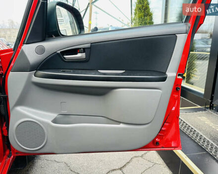 Красный Сузуки СХ4, объемом двигателя 1.6 л и пробегом 180 тыс. км за 7900 $, фото 23 на Automoto.ua