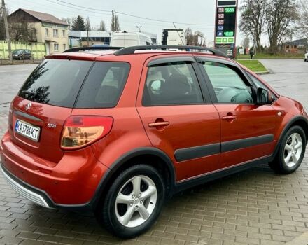 Красный Сузуки СХ4, объемом двигателя 1.6 л и пробегом 239 тыс. км за 7500 $, фото 3 на Automoto.ua