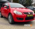 Красный Сузуки СХ4, объемом двигателя 1.6 л и пробегом 192 тыс. км за 7800 $, фото 1 на Automoto.ua