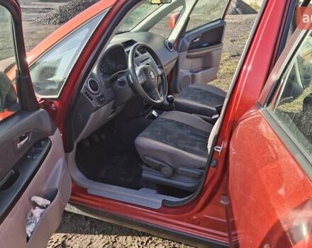 Красный Сузуки СХ4, объемом двигателя 1.5 л и пробегом 123 тыс. км за 4300 $, фото 8 на Automoto.ua