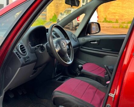 Красный Сузуки СХ4, объемом двигателя 1.6 л и пробегом 281 тыс. км за 5190 $, фото 15 на Automoto.ua