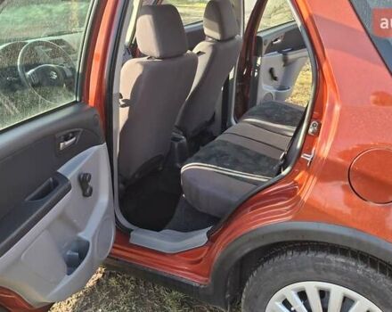 Красный Сузуки СХ4, объемом двигателя 1.5 л и пробегом 123 тыс. км за 4300 $, фото 7 на Automoto.ua