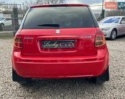 Красный Сузуки СХ4, объемом двигателя 1.6 л и пробегом 183 тыс. км за 6500 $, фото 5 на Automoto.ua