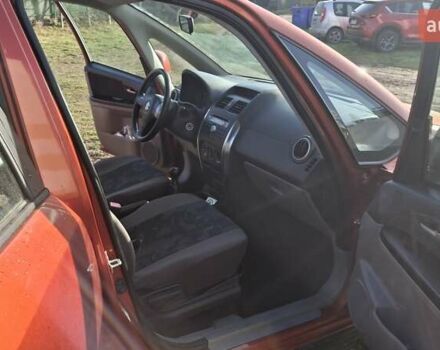 Красный Сузуки СХ4, объемом двигателя 1.5 л и пробегом 123 тыс. км за 4300 $, фото 4 на Automoto.ua