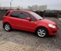 Красный Сузуки СХ4, объемом двигателя 1.6 л и пробегом 183 тыс. км за 6700 $, фото 2 на Automoto.ua