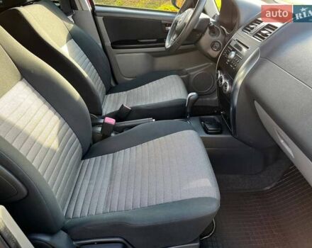 Червоний Сузукі СХ4, об'ємом двигуна 1.6 л та пробігом 101 тис. км за 7700 $, фото 15 на Automoto.ua