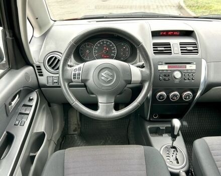 Красный Сузуки СХ4, объемом двигателя 1.6 л и пробегом 239 тыс. км за 7500 $, фото 16 на Automoto.ua