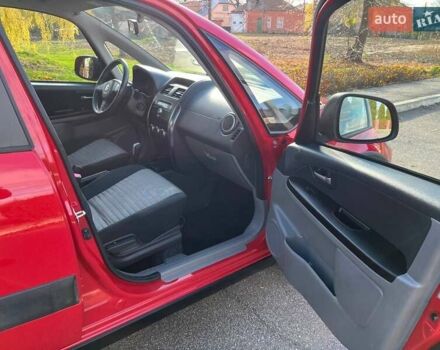 Червоний Сузукі СХ4, об'ємом двигуна 1.6 л та пробігом 101 тис. км за 7700 $, фото 14 на Automoto.ua