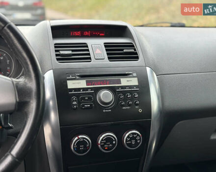 Сузуки СХ4 2008 в Киеве на Automoto.ua Красный Сузуки СХ4, объемом двигателя 1.6 л и пробегом 170 тыс. км за 7550 $, фото 34 на Automoto.ua