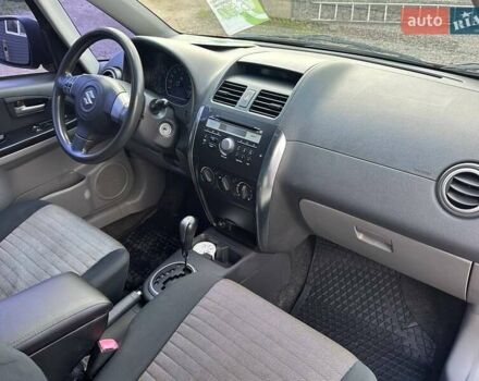 Красный Сузуки СХ4, объемом двигателя 1.6 л и пробегом 183 тыс. км за 6500 $, фото 32 на Automoto.ua