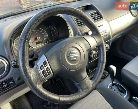 Червоний Сузукі СХ4, об'ємом двигуна 1.6 л та пробігом 101 тис. км за 7700 $, фото 10 на Automoto.ua