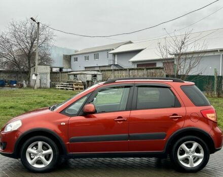 Красный Сузуки СХ4, объемом двигателя 1.6 л и пробегом 239 тыс. км за 7500 $, фото 5 на Automoto.ua