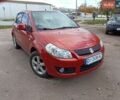 Красный Сузуки СХ4, объемом двигателя 1.6 л и пробегом 112 тыс. км за 4700 $, фото 1 на Automoto.ua
