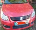 Красный Сузуки СХ4, объемом двигателя 1.6 л и пробегом 230 тыс. км за 6300 $, фото 1 на Automoto.ua