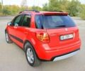 Червоний Сузукі СХ4, об'ємом двигуна 1.6 л та пробігом 200 тис. км за 7000 $, фото 4 на Automoto.ua