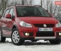 Красный Сузуки СХ4, объемом двигателя 1.6 л и пробегом 283 тыс. км за 5600 $, фото 1 на Automoto.ua