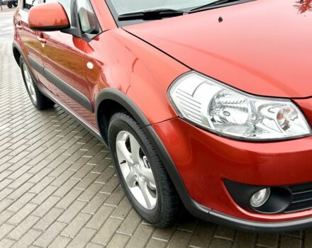 Красный Сузуки СХ4, объемом двигателя 1.6 л и пробегом 239 тыс. км за 7500 $, фото 7 на Automoto.ua