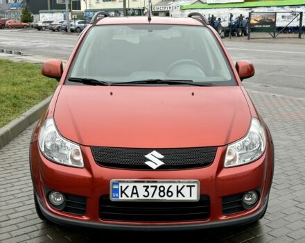 Красный Сузуки СХ4, объемом двигателя 1.6 л и пробегом 239 тыс. км за 7500 $, фото 1 на Automoto.ua