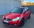 Красный Сузуки СХ4, объемом двигателя 1.6 л и пробегом 212 тыс. км за 6800 $, фото 1 на Automoto.ua