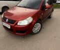 Червоний Сузукі СХ4, об'ємом двигуна 1.6 л та пробігом 230 тис. км за 5999 $, фото 1 на Automoto.ua
