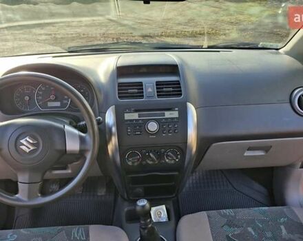 Красный Сузуки СХ4, объемом двигателя 1.5 л и пробегом 123 тыс. км за 4300 $, фото 9 на Automoto.ua