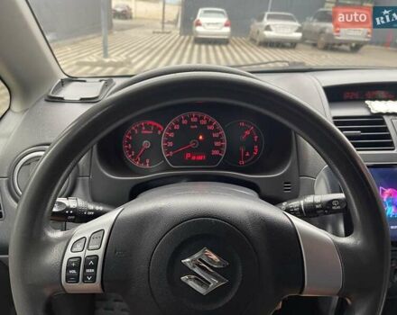 Красный Сузуки СХ4, объемом двигателя 1.59 л и пробегом 191 тыс. км за 5999 $, фото 19 на Automoto.ua