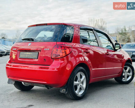 Красный Сузуки СХ4, объемом двигателя 1.6 л и пробегом 180 тыс. км за 7900 $, фото 1 на Automoto.ua
