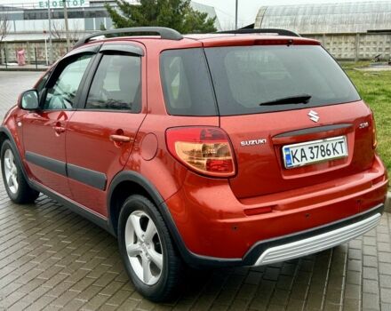Красный Сузуки СХ4, объемом двигателя 1.6 л и пробегом 239 тыс. км за 7500 $, фото 4 на Automoto.ua