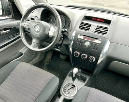 Красный Сузуки СХ4, объемом двигателя 1.6 л и пробегом 239 тыс. км за 7500 $, фото 18 на Automoto.ua