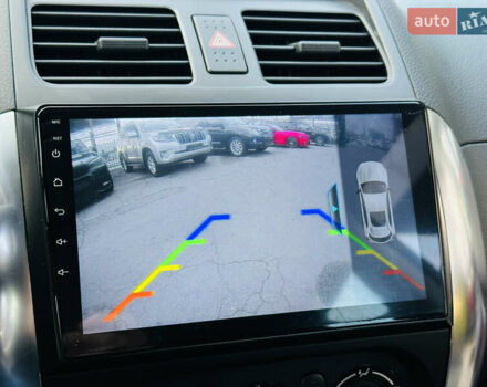 Красный Сузуки СХ4, объемом двигателя 1.6 л и пробегом 180 тыс. км за 7900 $, фото 31 на Automoto.ua