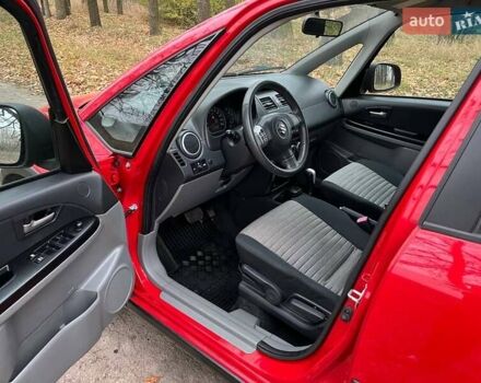 Красный Сузуки СХ4, объемом двигателя 1.6 л и пробегом 101 тыс. км за 7700 $, фото 6 на Automoto.ua