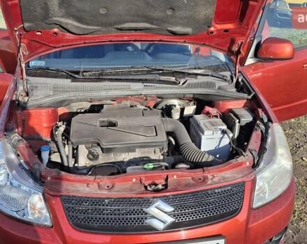 Красный Сузуки СХ4, объемом двигателя 1.5 л и пробегом 123 тыс. км за 4300 $, фото 10 на Automoto.ua