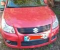 Красный Сузуки СХ4, объемом двигателя 1.6 л и пробегом 230 тыс. км за 6300 $, фото 1 на Automoto.ua