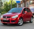 Червоний Сузукі СХ4, об'ємом двигуна 1.6 л та пробігом 281 тис. км за 5790 $, фото 1 на Automoto.ua