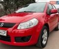 Красный Сузуки СХ4, объемом двигателя 1.59 л и пробегом 94 тыс. км за 6499 $, фото 1 на Automoto.ua