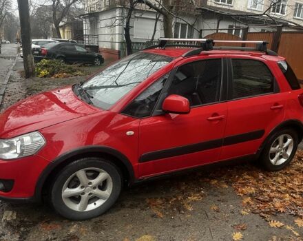 Красный Сузуки СХ4, объемом двигателя 1.6 л и пробегом 183 тыс. км за 6800 $, фото 2 на Automoto.ua