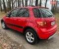 Красный Сузуки СХ4, объемом двигателя 1.6 л и пробегом 101 тыс. км за 7700 $, фото 2 на Automoto.ua