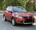 Красный Сузуки СХ4, объемом двигателя 1.6 л и пробегом 145 тыс. км за 7500 $, фото 1 на Automoto.ua