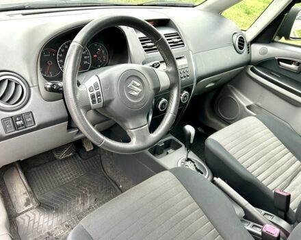 Красный Сузуки СХ4, объемом двигателя 1.6 л и пробегом 239 тыс. км за 7500 $, фото 14 на Automoto.ua