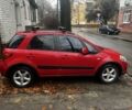 Красный Сузуки СХ4, объемом двигателя 1.6 л и пробегом 183 тыс. км за 6800 $, фото 3 на Automoto.ua