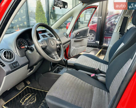 Красный Сузуки СХ4, объемом двигателя 1.6 л и пробегом 180 тыс. км за 7900 $, фото 12 на Automoto.ua