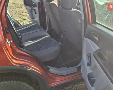 Красный Сузуки СХ4, объемом двигателя 1.5 л и пробегом 123 тыс. км за 4300 $, фото 5 на Automoto.ua