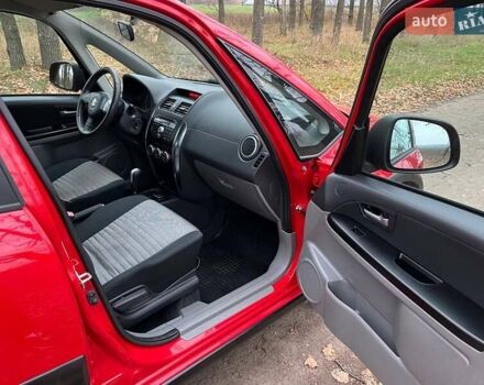 Красный Сузуки СХ4, объемом двигателя 1.6 л и пробегом 101 тыс. км за 7700 $, фото 12 на Automoto.ua