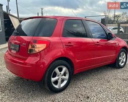 Красный Сузуки СХ4, объемом двигателя 1.6 л и пробегом 183 тыс. км за 6500 $, фото 4 на Automoto.ua