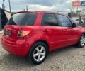 Красный Сузуки СХ4, объемом двигателя 1.6 л и пробегом 183 тыс. км за 6500 $, фото 4 на Automoto.ua