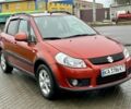 Красный Сузуки СХ4, объемом двигателя 1.6 л и пробегом 239 тыс. км за 7500 $, фото 2 на Automoto.ua