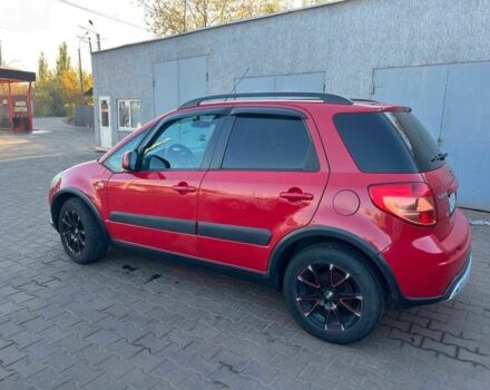 Красный Сузуки СХ4, объемом двигателя 1.6 л и пробегом 212 тыс. км за 6800 $, фото 3 на Automoto.ua